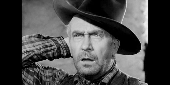 William Demartest as George Fury, baffled by the way the folks of Plainville are acting in Along Came Jones (1945)
