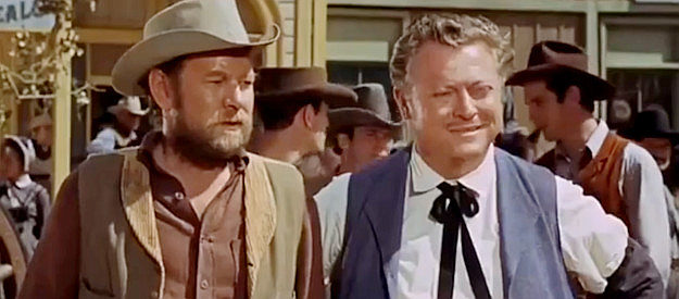 William Phipps as Fred Norton and William Mims as Ed Scovie, thrilled when Cal Wayne refuses to back down to Grant Evers' gunmen in Gunfight in Abilene (1967)