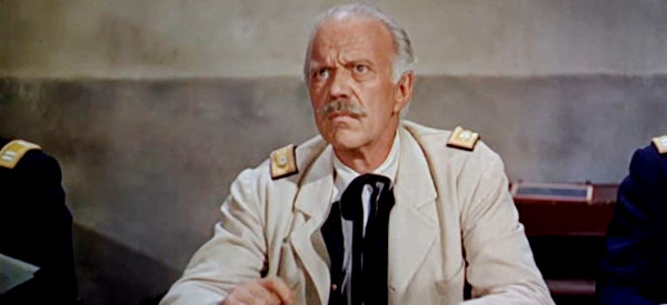 Willis Bouchey as Col. Otis Fosgate, presiding over the rape and murder trial of Sgt. Rutledge in Sergeant Rutledge (1960)