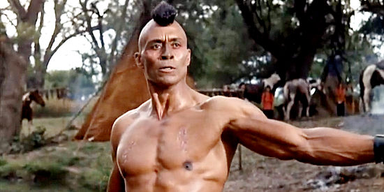Woody Strode as Stone Calf, unhappy that Quanah Parker is negotiating with the whites in Two Rode Together (1961)