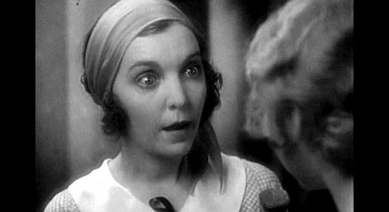 Zasu Pitts as Louise, Miriam McDowell's confidant in matters of gossip and love in River's End (1930)