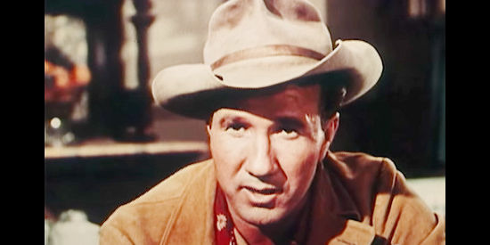 Marty Robbins as himself, delivering tough talk to McCord in Ballad of a Gunfighter (1964)