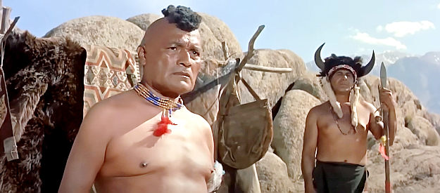 Joe Molina as the Comanche chief, negotiating a trade with Jefferson Cody in Comanche Station (1960)