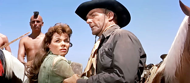Nancy Gates as Nancy Lowe, being guided away from the Comanche camp by Jefferson Cody (Randolph Scott) in Comanche Station (1960)