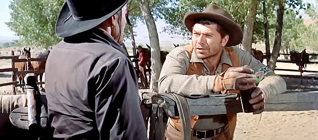 Claude Akins as Ben Lane chats with Jefferson Cody (Randolph Scott), the man in line for a $5,000 bounty in Comanche Station (1960)