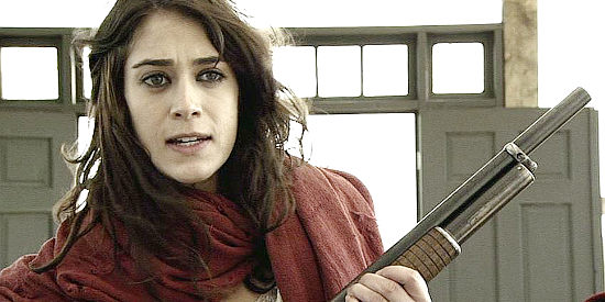 Lizzy Caplan as Juliette Flowers, arriving back in Glory with news of Ransom's death in The Last Rites of Ransom Pride (2010)
