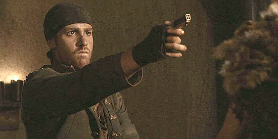 Jon Foster as Champ Pride, pulling a derringer on an adversary in The Last Rites of Ransom Pride (2010)