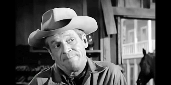 Dan Duryea as Bart Thome, plotting to get the money for Josh McCloud's cattle in He Rides Tall (1964)