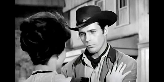 Tony Young as Marshal Morg Rocklin, making up with Ellie Daniels (Madlyn Rhue) after a love's spat in He Rides Tall (1964)