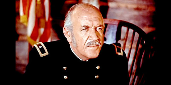 Addison Richards as Gen. Crook, doling out orders for the supply patrol in Fort Yuma (1955)