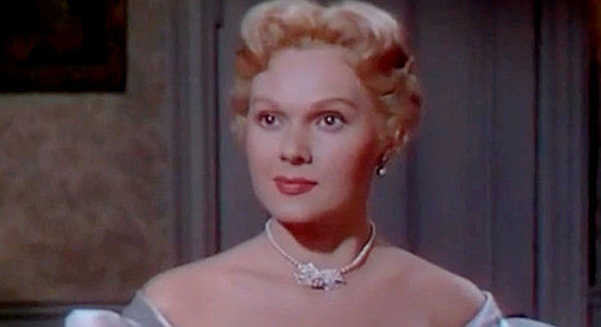 Adele Jergens as Reva Cairn, the saloon singer Sugarfoot underestimates, then falls for in Sugarfoot (1951)