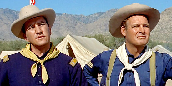 Ainslie Pryor as Capt. Larsen and Charles Drake as Sgt. Tom Sweeny give Clum a soldier's welcome when he arrives at San Carlos in Walk the Proud Land (1956)