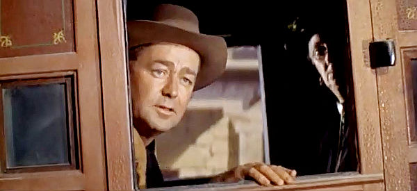 Alan Ladd as Peter Van Hoek, aka The Dutchman, returning to Prescott for a measure of revenge after spending time in prison in The Badlanders (1958)