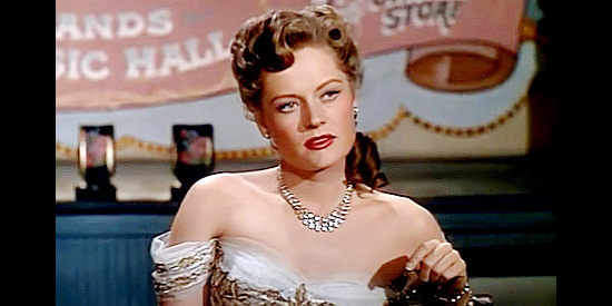 Alexis Smith as Mary Williams, leader of a dance troupe with a secret to keep in Wyoming Mail (1950)