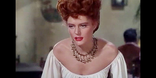 Alexis Smith as Rouge de Lisle, the temptress who lures Kip Davis into gun-running in South of St. Louis (1949)