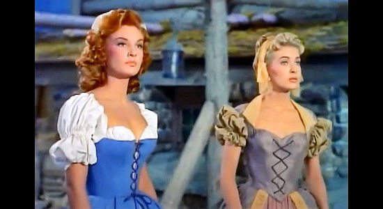 Allison Hayes as Greta Jones and Lori Nelson as Cynthia Stanhope, wondering about Jonathan's decision to leave them behind in Mohawk (1956)