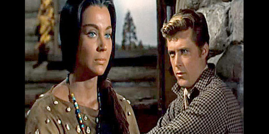 Andra Martin as Wahleeah, working under the watchful eye of Anse Harper (Edd Byrnes) in Yellowstone Kelly (1959)