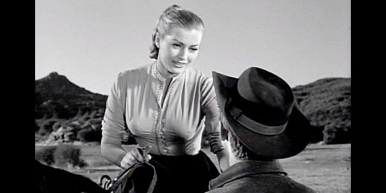 Anita Eckberg as Valerie, encouraging Herb Garth not to leave the ranch in Valerie (1957)