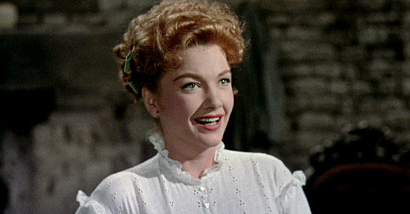 Anne Baxter as Lorna Saunders, a woman with a questionable past in Three Violent People (1957)