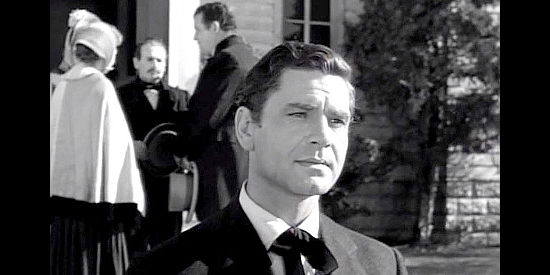 Anthony Steel as Rev. Blake, the new minister in town who takes an interest in Valerie's well-being in Valerie (1957)