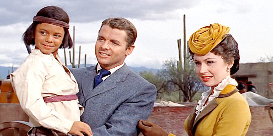 Audie Murphy as John P. Clum introduces his new wife Mary (Pat Crowley) to Tono (Eugene Mazzola) and Tianay in Walk the Proud Land (1956)