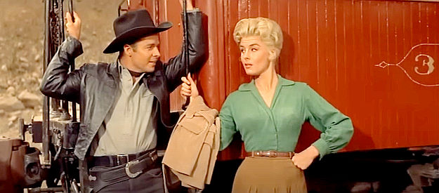 Audie Murphy as The Uticas Kid and Elaine Stewart as Verna Kimball, about to be held for ransom in Night Passage (1957)