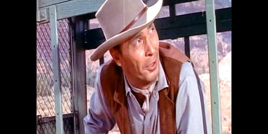 Barry Sullivan as Link Ferris, one of the outlaws being delivered for justice in Dragoon Wells Massacre (1957)