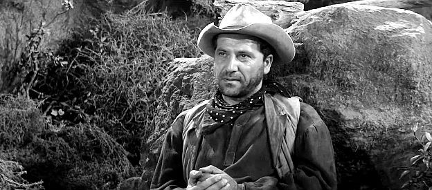 Baynes Barron as Corbin, the gunrunner being taken to face justice by Blake and his men in Ambush at Cimarron Pass (1958)