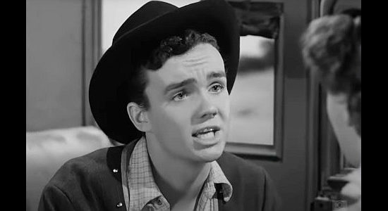 Ben Cooper as Jesse James, reacting to Sally Maris's urging that he abandon Quantrill in The Woman They Almost Lynched (1953)