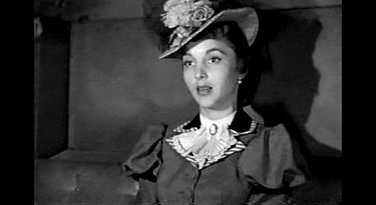 Beverly Garland as Gail Bonner, arriving in Bitter Creek to marry cattle king Quentin Allen in Bitter Creek (1954)