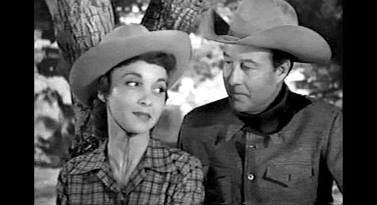 Beverly Garland as Gail Bonner, explaining how she met Quentin Allen to Clay Tyndall (Bill Elliott) in Bitter Creek (1954)