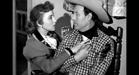 Beverly Garland as Gail Bonner, helping tend Clay Tyndall's (Bill Elliott's) wound in Bitter Creek (1954)