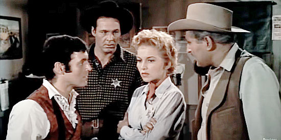 Beverly Garland as Marshal Rose Hood surrounded by (from left) Jonathan Haze as Jake Hayes, Chris Alcaide as Deputy Joshua Tate and Martin Kingsley as Mayor Polk in Gunslinger (1956)