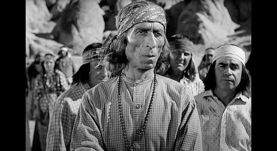 Billy Wilkerson as leader of the Indian camp Ford and Mary Smith stumble upon in Desert Pursuit (1952)