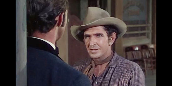 Bob Steele as Slim Hansen, one of the men who work for the gun runners in South of St. Louis (1949)