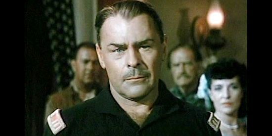 Brian Donlevy as Capt. Dempster, realizing Lorabelle Larkin was involved in the stage holdup in Slaughter Trail (1951)