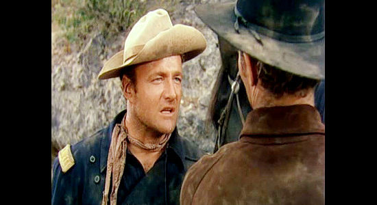 Brian Keith as Capt. Bill North, following orders in pursuit of peace with Toriano and the Apaches in Arrowhead (1953)