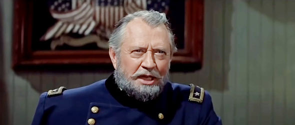 Carl Benton Reid as Gen Howard, ready to hand down judgment on Comanche Todd in The Last Wagon (1956)