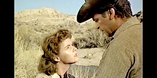 Carolyn Craig as Junie Hatchett explaining her plight to Logan Cates (Rory Calhoun) in Apache Territory (1958)