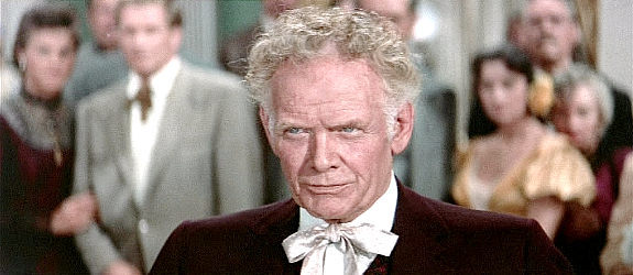 Charles Bickford as Maj. Henry Terrell, listening to Rufus Hannassey's rant at his party in The Big Country (1958)