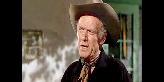 Charles Bickford as Richard Lavery, a cattle king eager to turn the drive to El Paso over to his long-lost son in Branded (1950)