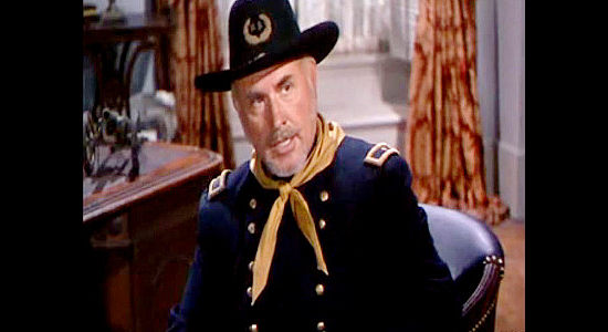 Charles Evans as Gen. Hildebrandt, arriving in Galeston to investigate Roger Hale in The Vanquished (1953)