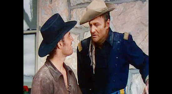 Charlton Heston as Ed Bannon and Brian Keith as Capt. Bill North in a dispute over a pretty lady in Arrowhead (1953)