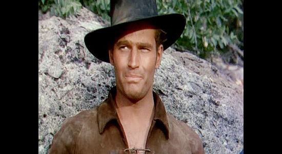 Charlton Heston as Ed Bannon, ready to lead the cavalry patrol against Toriano and his Apaches in Arrowhead (1953)