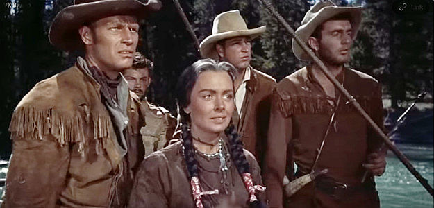 Charlton Heston as Lt. William Clark, Donna Reed as Sacajawea and some of Clark's men watching for trouble in Far Horizons (1955)