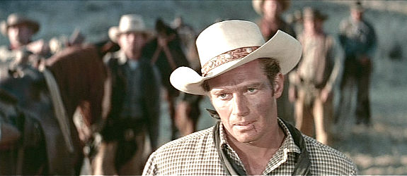 Charlton Heston as Steve Leech, deciding to follow Maj. Terrell into Blanco Canyon in The Big Country (1958)
