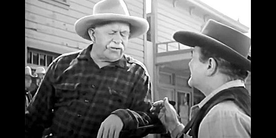 Chester Conklin as Dick Mooney, the town drunk whose robbed of $2,000 by the bandits in Apache Woman (1955)