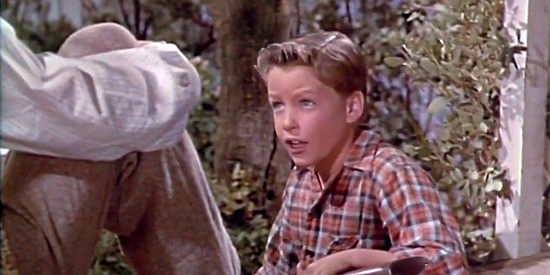 Christopher Olsen as young Billy, the son Tracy Powell abandons in his quest for gold in The Naked Hills (1956)
