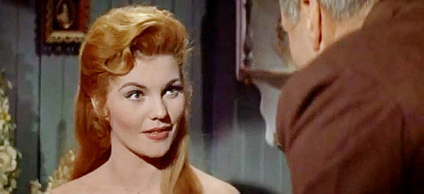 Claire Kelly as Ada Winton, the mistress Loundsberry keeps locked in a room so she can't meet other men in The Badlanders (1958)