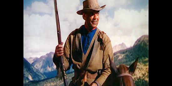 Clark Gable as Flint Mitchell, his focus set on trapping in the beaver-rich area controlled by the Blackfoot tribe in Across the Wide Missouri (1951)